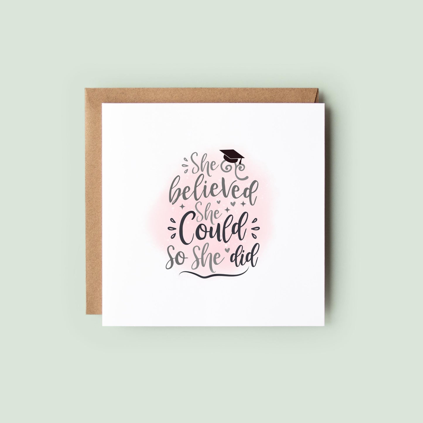 Graduation card for her featuring the quote “She Believed She Could So She Did” with a graduation cap and soft pink background. Inspirational congratulations card for female university graduates, college graduates and academic achievements.