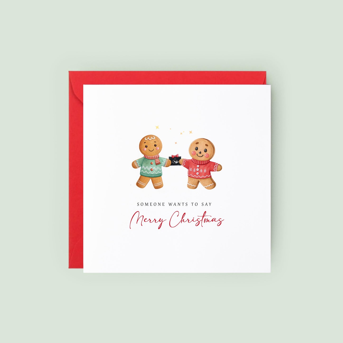 Announce your pregnancy this Christmas with a cute LGBTQ+ gingerbread card for two dads, featuring a festive baby scan reveal design.