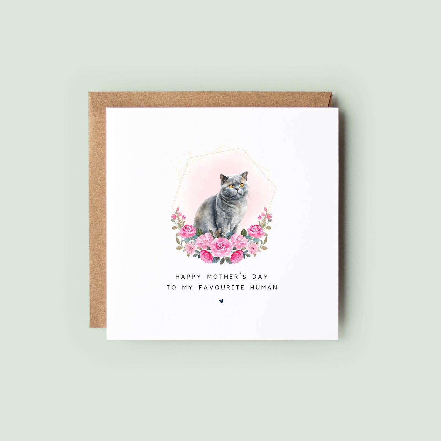 British Shorthair Mother’s Day card with grey watercolour cat sitting in a blush pink floral frame and text “Happy Mother’s Day to my favourite human”, shown as a square white 148x148mm (6x6) card with Kraft envelope behind.