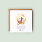 Christening or Holy Communion card with Bible verse Matthew 19:14, religious keepsake card featuring cross, bread, wine, Bible and dove illustration, styled with flowers
