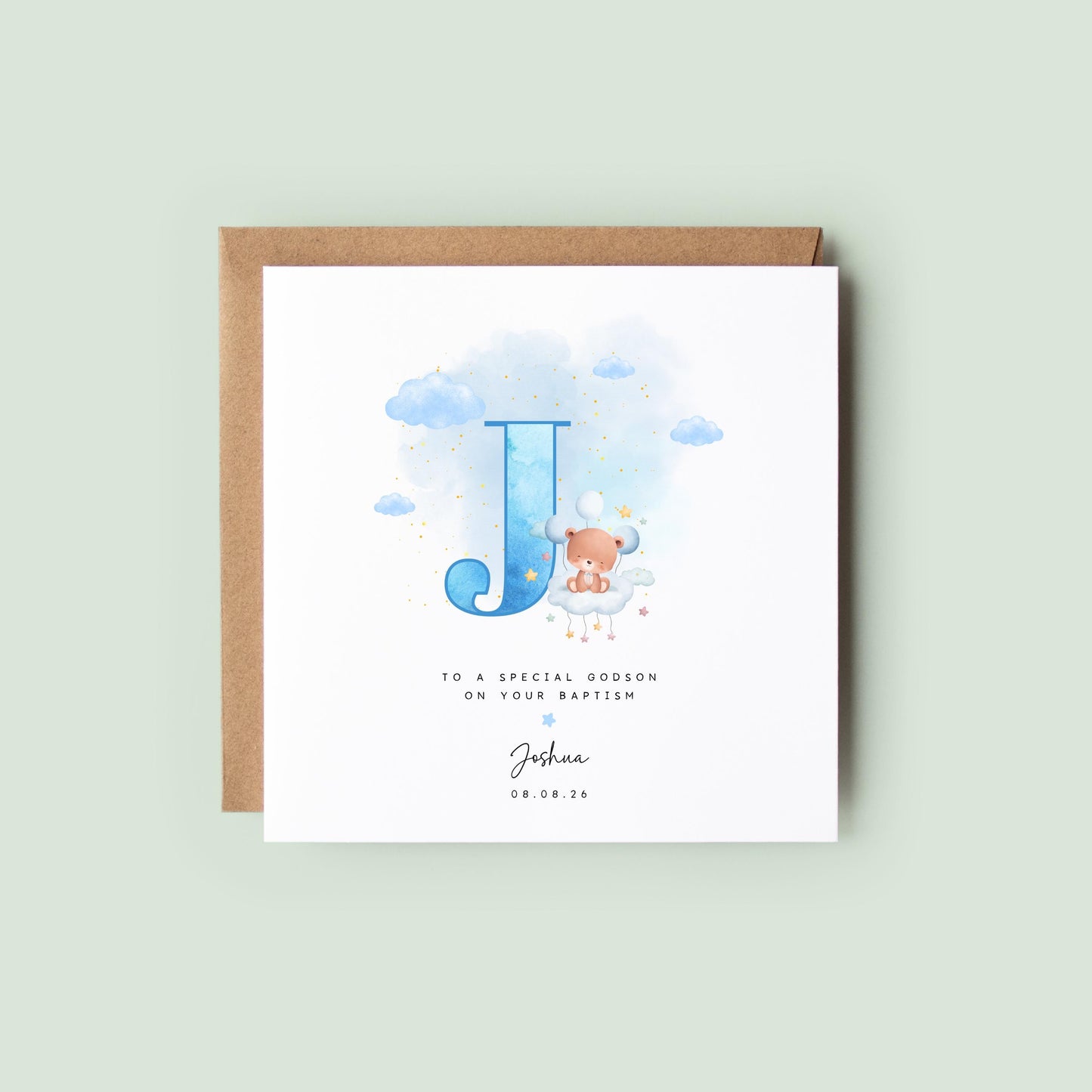 Personalised baptism card for baby boy with blue watercolour letter, teddy bear on cloud, and custom name and date. Ideal for christenings or naming days.