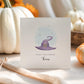 Personalised Halloween card featuring a purple witch hat with a starry background, “Happy Halloween” text, and the name Thomas beneath
