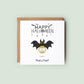 Square Halloween scratch card featuring a black bat with yellow eyes and a gold scratch-off circle that hides a surprise message. Text reads “Happy Halloween” and “Trick or Treat” in spooky fonts.