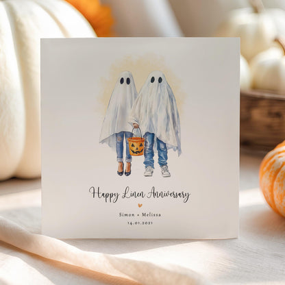 Personalised linen anniversary card featuring a romantic watercolour ghost couple with custom names and anniversary date.