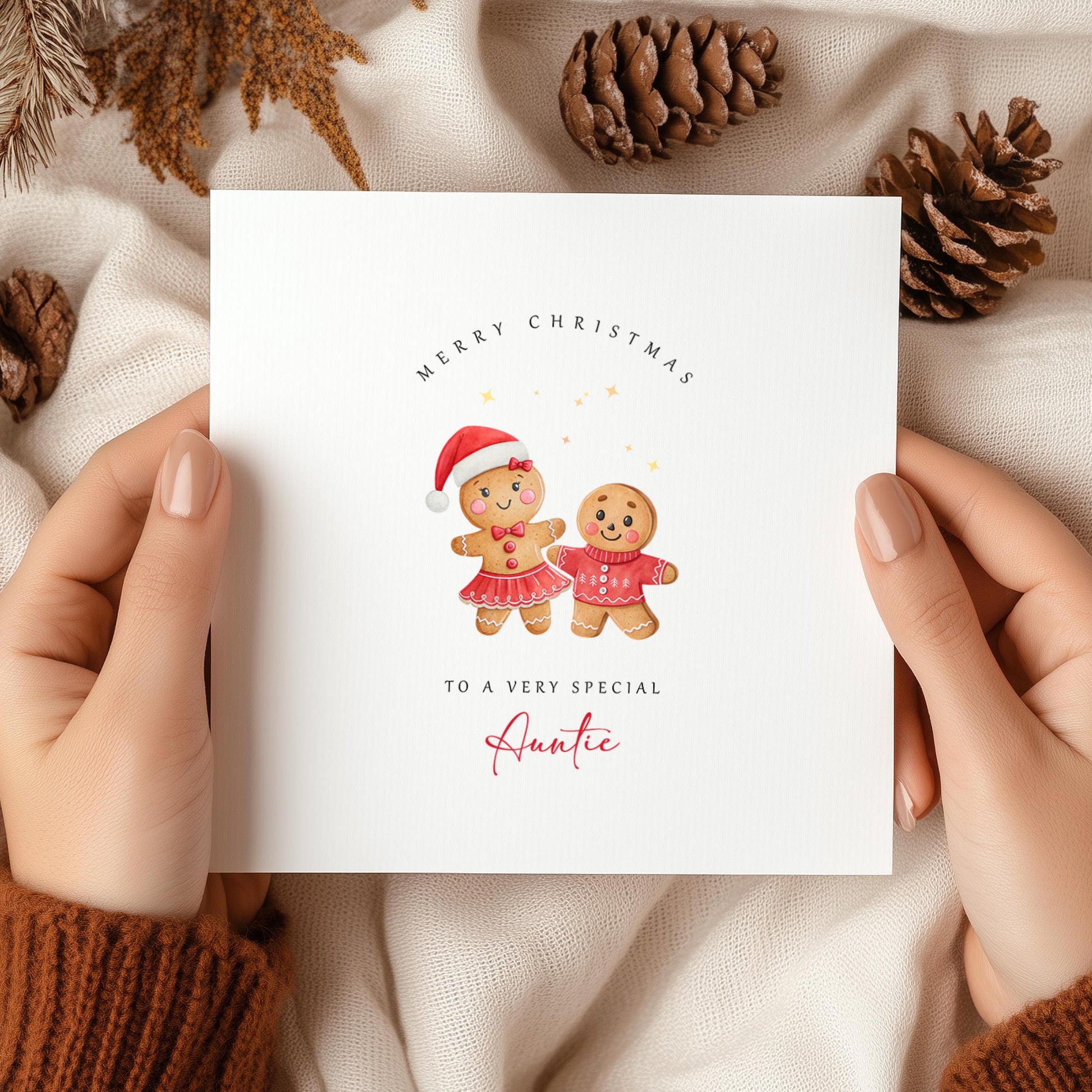 Cute Auntie Christmas card featuring festive gingerbread characters. A thoughtful Christmas greeting printed on premium recycled cardstock.