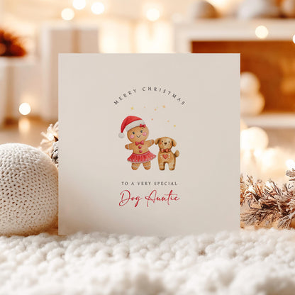 Cute Dog Auntie Christmas card featuring a festive gingerbread girl and gingerbread dog with a heart, perfect card from the dog.