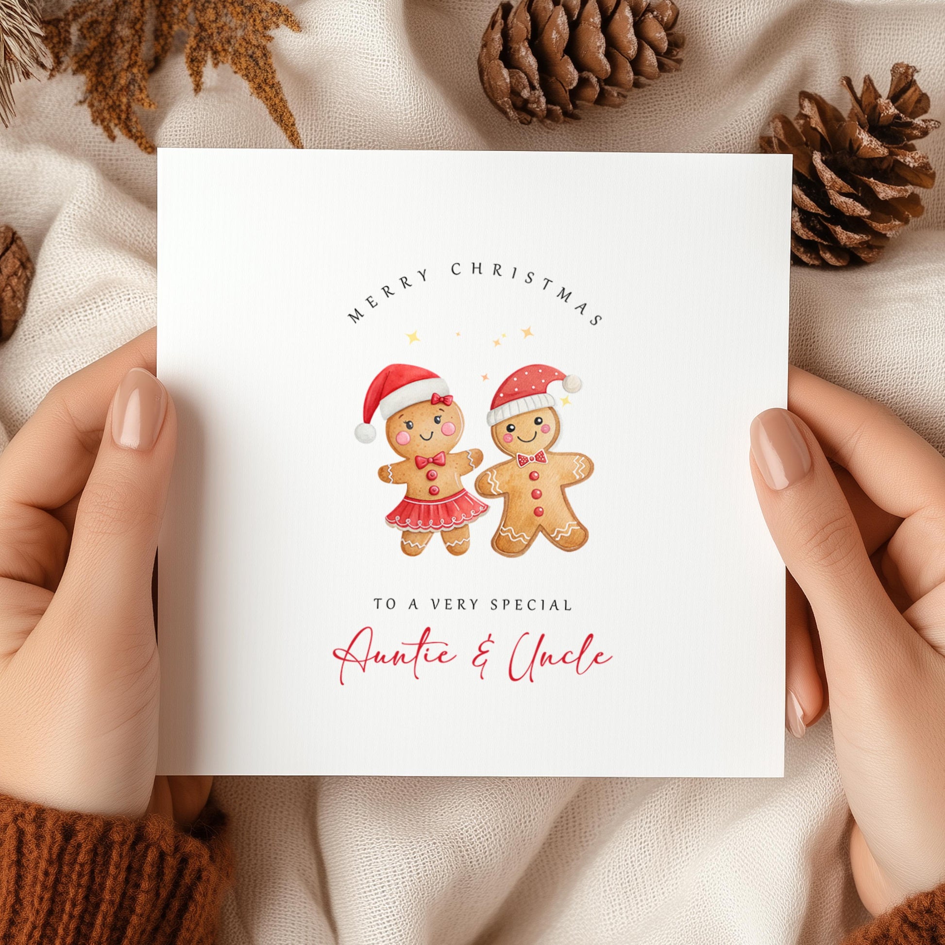 Personalised Christmas card for Auntie and Uncle featuring a cute gingerbread couple wearing Santa hats with festive Christmas wording.