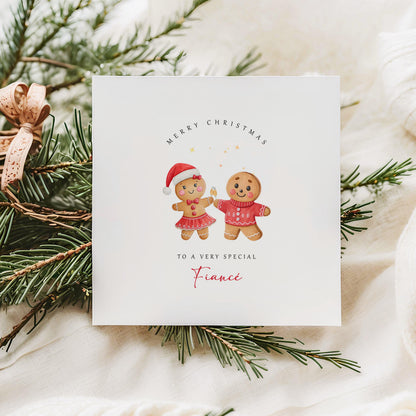 Christmas card featuring cute gingerbread couple with the message “Merry Christmas to a Very Special Fiancé” – sweet festive card from fiancée.