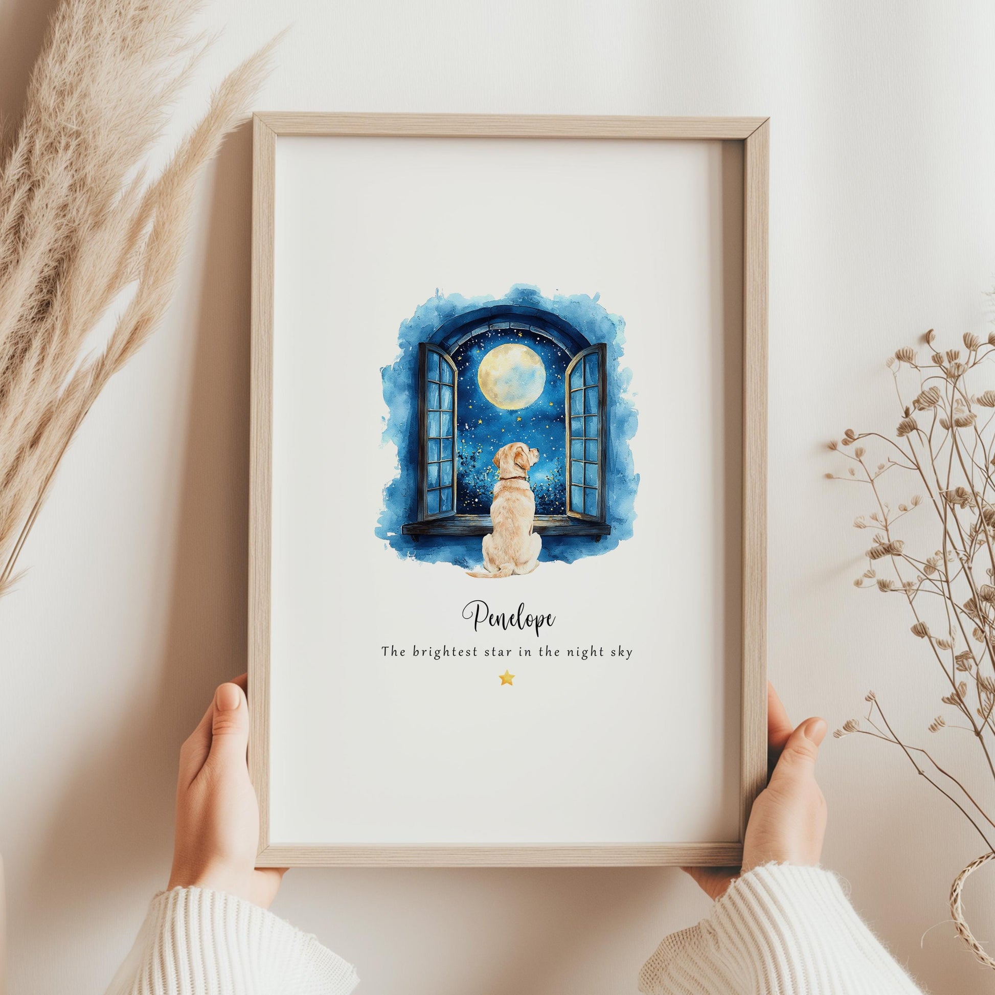 Personalised dog memorial print showing a dog looking out of an open window at the moon and stars with the quote “The brightest star in the night sky” and the pet’s name beneath.