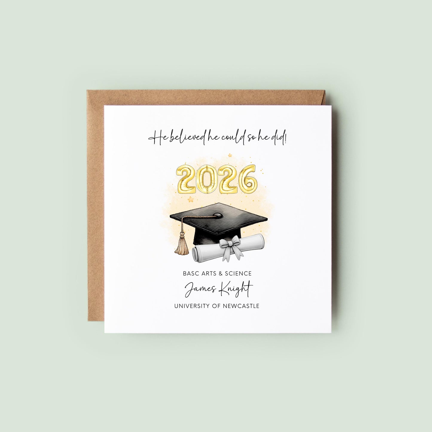Personalised graduation card for him featuring gold 2026 balloons, graduation cap and diploma scroll. Custom graduate card with degree title, graduate name, university and motivational graduation quote.
