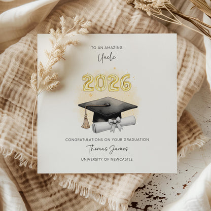 Personalised uncle graduation card featuring gold 2026 balloons, graduation cap and diploma scroll. Custom graduation card with uncle title, graduate name, university details and congratulations message, ideal for university graduation celebrations.