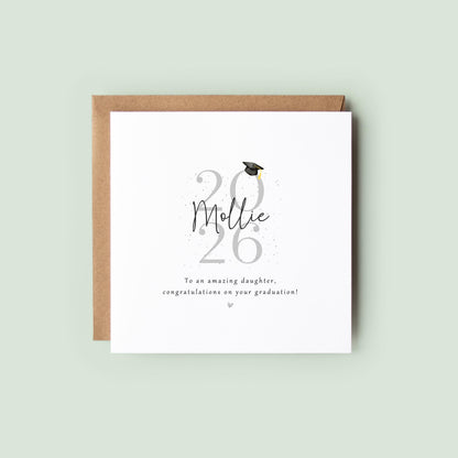 Personalised graduation card for a friend featuring custom name, graduation year and congratulations message with graduation cap illustration and Kraft envelope.