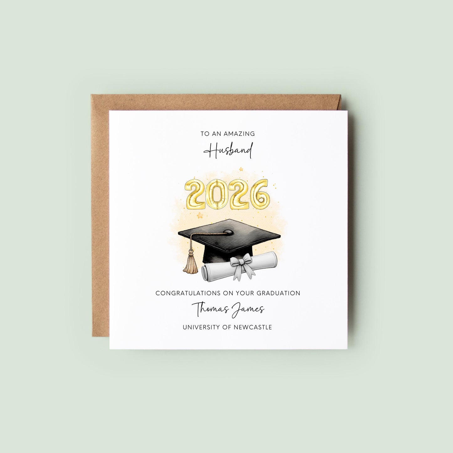 Personalised husband graduation card featuring gold 2026 balloons, graduation cap and diploma scroll. Custom university graduation card with husband title, graduate name, university details and congratulations message.