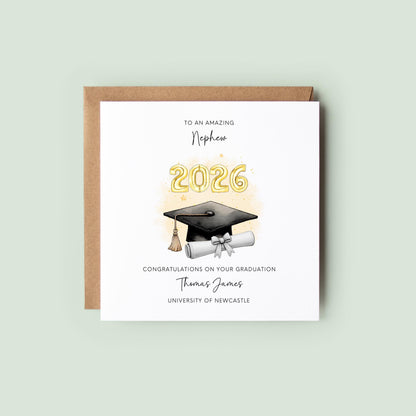 Personalised nephew graduation card featuring gold 2026 balloons, graduation cap and diploma scroll. Custom university graduation card with nephew title, graduate name, university details and congratulations message.