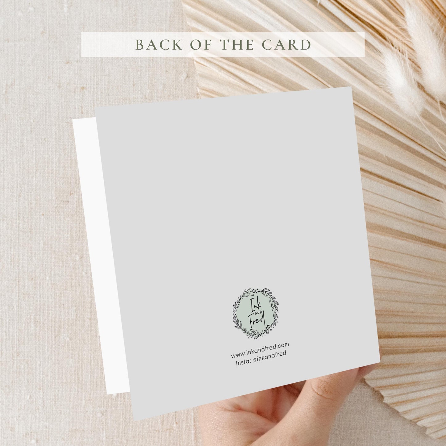 Personalised nurse graduation card featuring a female graduate in blue nursing scrubs with a stethoscope, graduation cap, academic robe and sash, personalised with her name, university and year.