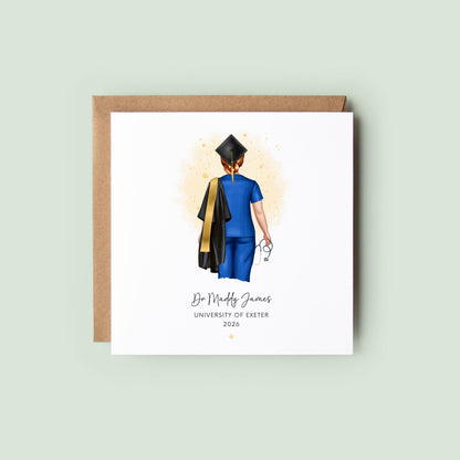 Personalised nurse graduation card featuring a female graduate in blue nursing scrubs with a stethoscope, graduation cap, academic robe and sash, personalised with her name, university and year.