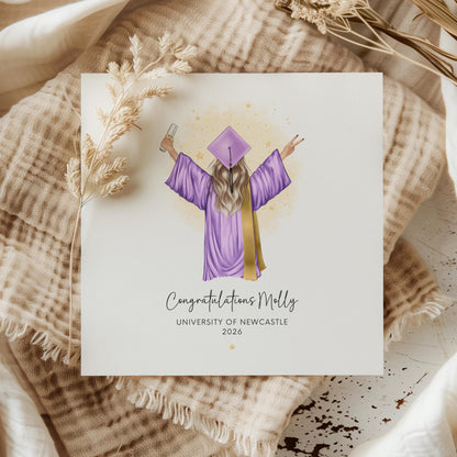 Personalised graduation card for her featuring a custom illustration of a female graduate from behind, wearing a black cap and gown, holding a diploma. Text reads "She believed she could so she did". Unique handmade university graduation keepsake gift.