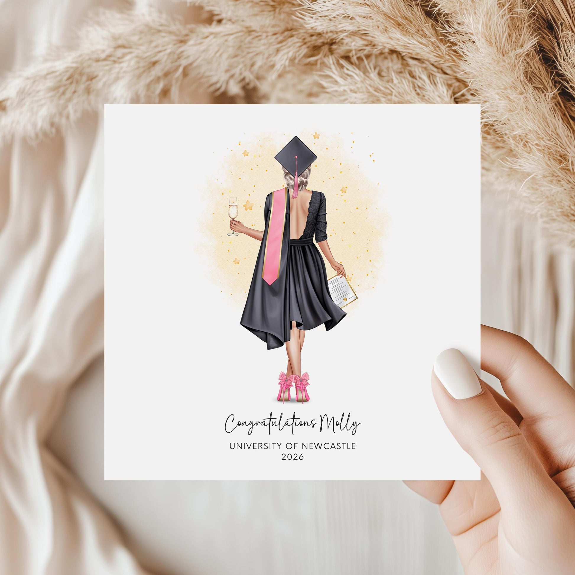 Personalised graduation card featuring a custom female graduate illustration with personalised outfit, hair, university name and graduation year.