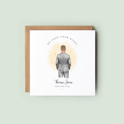 Personalised prom card featuring a male figure in a silver suit with custom name and prom date.