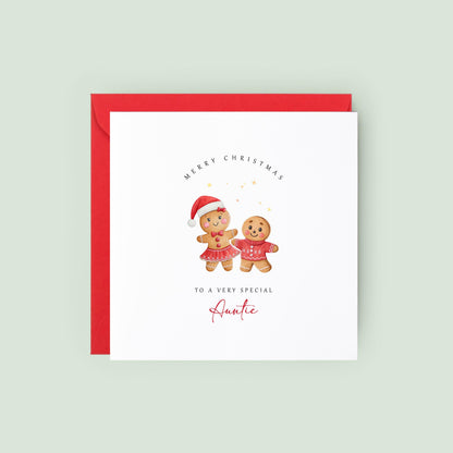 Cute Auntie Christmas card featuring festive gingerbread characters. A thoughtful Christmas greeting printed on premium recycled cardstock.