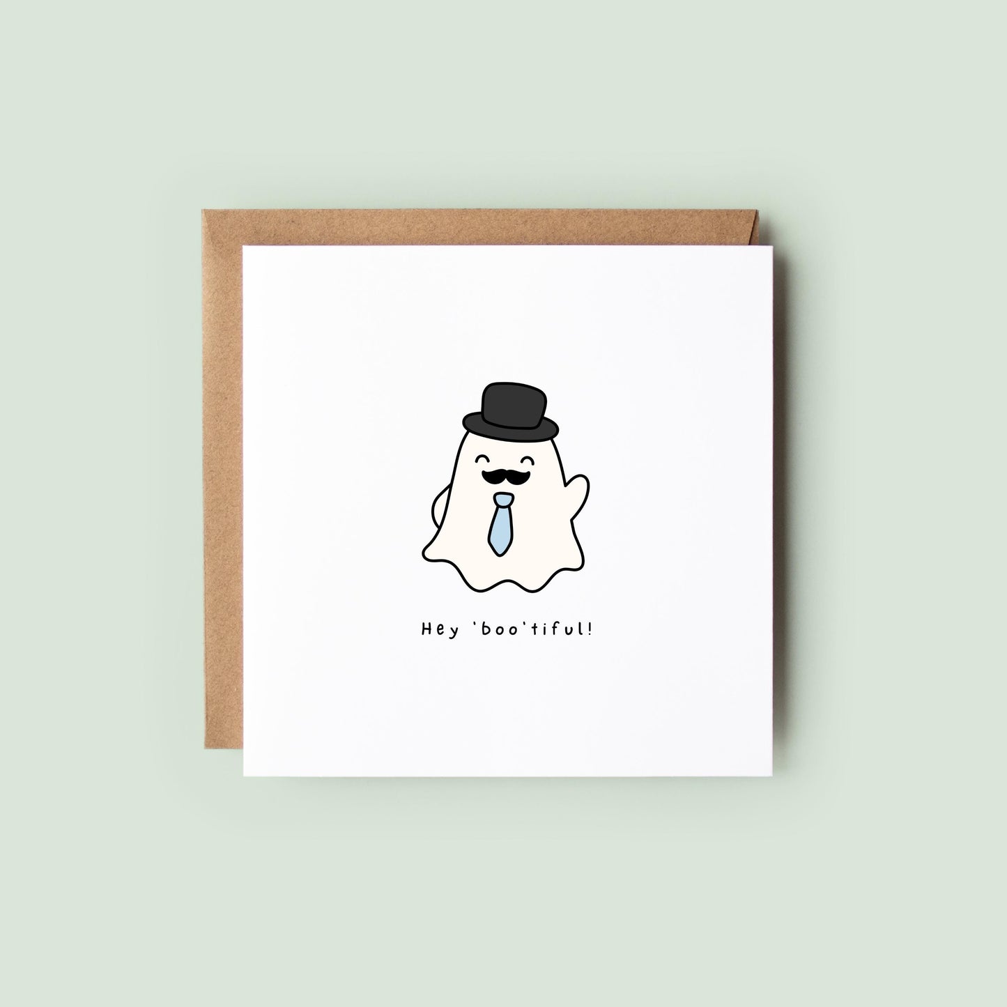 Cute Halloween greeting card featuring a smiling ghost wearing a top hat, moustache and blue tie with the pun "Hey Boo'tiful!"