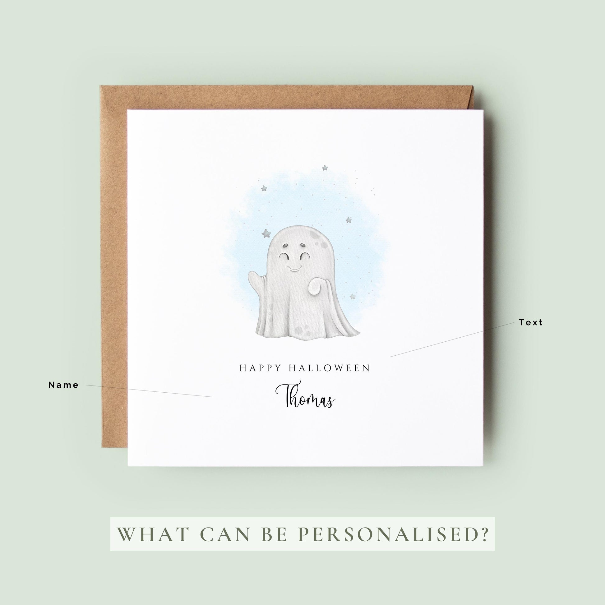 Personalised Halloween greeting card featuring a cute smiling ghost with a custom name underneath and the words "Happy Halloween" on a white card.