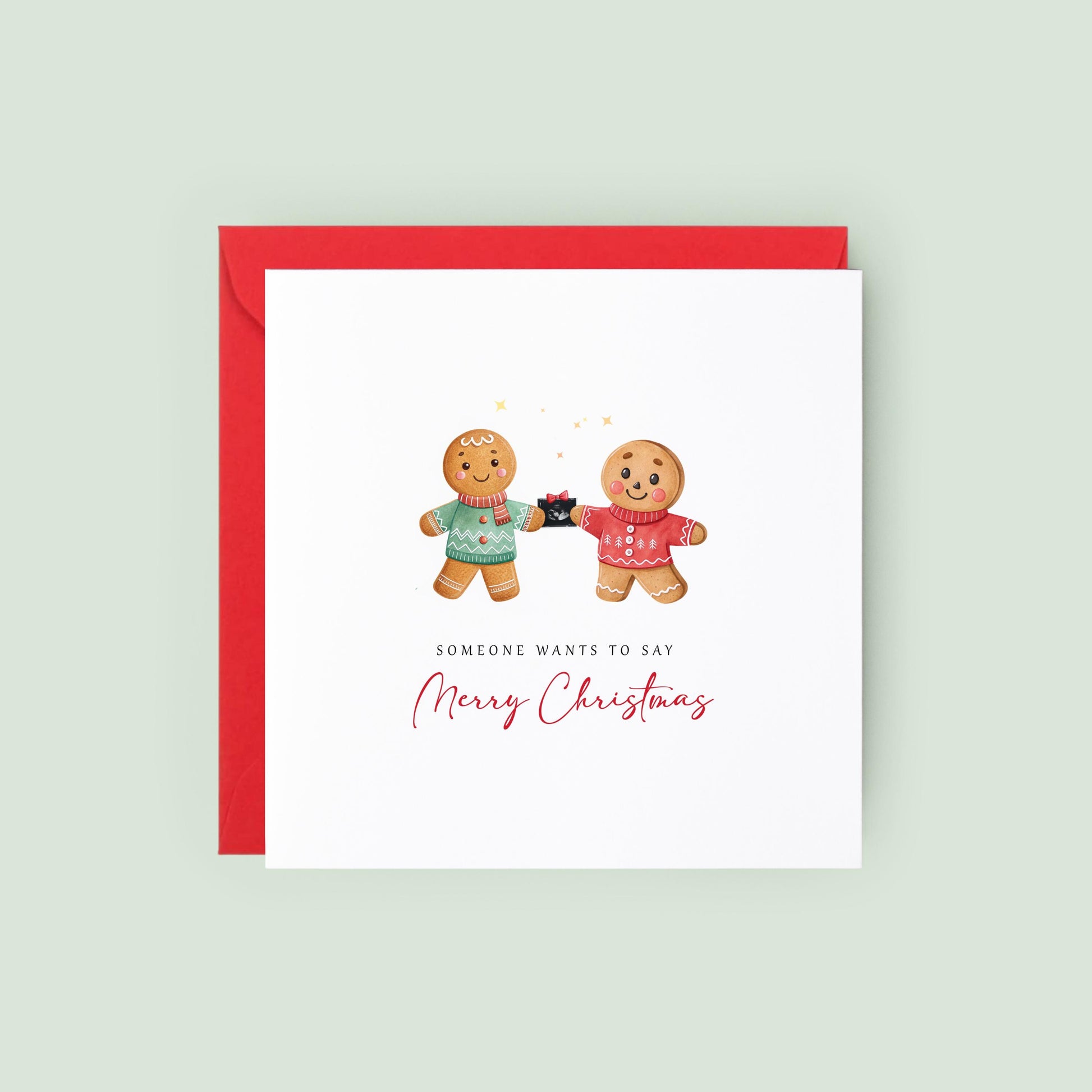 Announce your pregnancy this Christmas with a cute LGBTQ+ gingerbread card for two dads, featuring a festive baby scan reveal design.