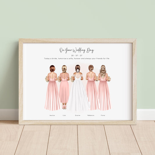 Framed personalised bridesmaid print showing bride and four bridesmaids illustrated from behind in blush dresses with bouquets, plus wedding date and names underneath, displayed in a light wood frame against a neutral background.