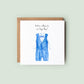 Personalised page boy proposal card with watercolour blue waistcoat and shorts suit, personalised text at top, shown as a square white 148x148mm (6x6) card with Kraft envelope behind.