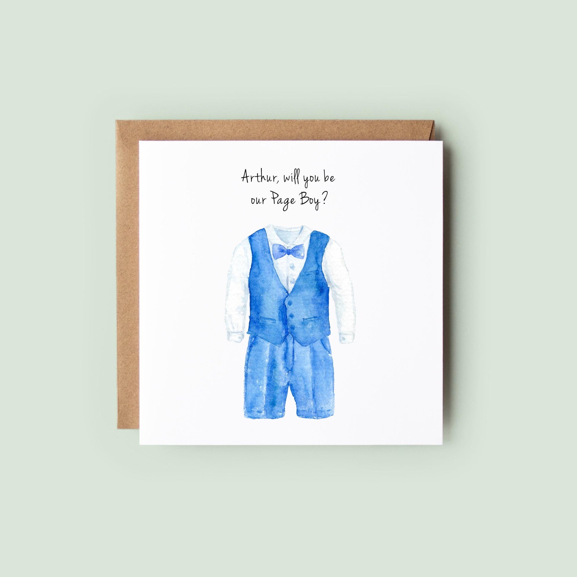 Personalised page boy proposal card with watercolour blue waistcoat and shorts suit, personalised text at top, shown as a square white 148x148mm (6x6) card with Kraft envelope behind.